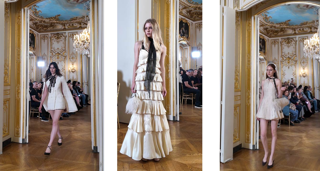 Mannequin en ensemble ivoire à cape courte et nœud noir, collection BEQUEENSTORY, défilant dans les salons de l'Hôtel Le Marois lors du défilé NEXT ASIA à la Paris Fashion Week, Mannequin en longue robe ivoire à volants étagés avec lavallière noire et petit sac à plumes, collection BEQUEENSTORY, lors du défilé NEXT ASIA, Mannequin en mini-robe ivoire à volants avec sac à plumes, collection BEQUEENSTORY, dans les salons dorés de l'Hôtel Le Marois pendant le défilé NEXT ASIA