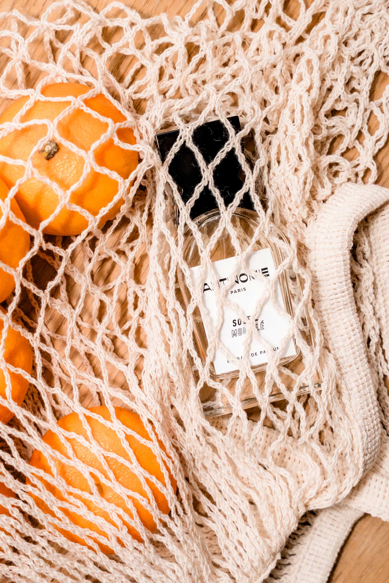 Parfum Antinomie : Soleil Mouillé dans un filet